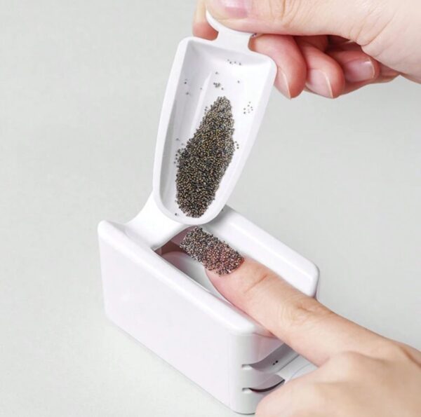 Caja de reciclaje de glitter.