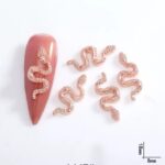 Decoración serpiente Rosado